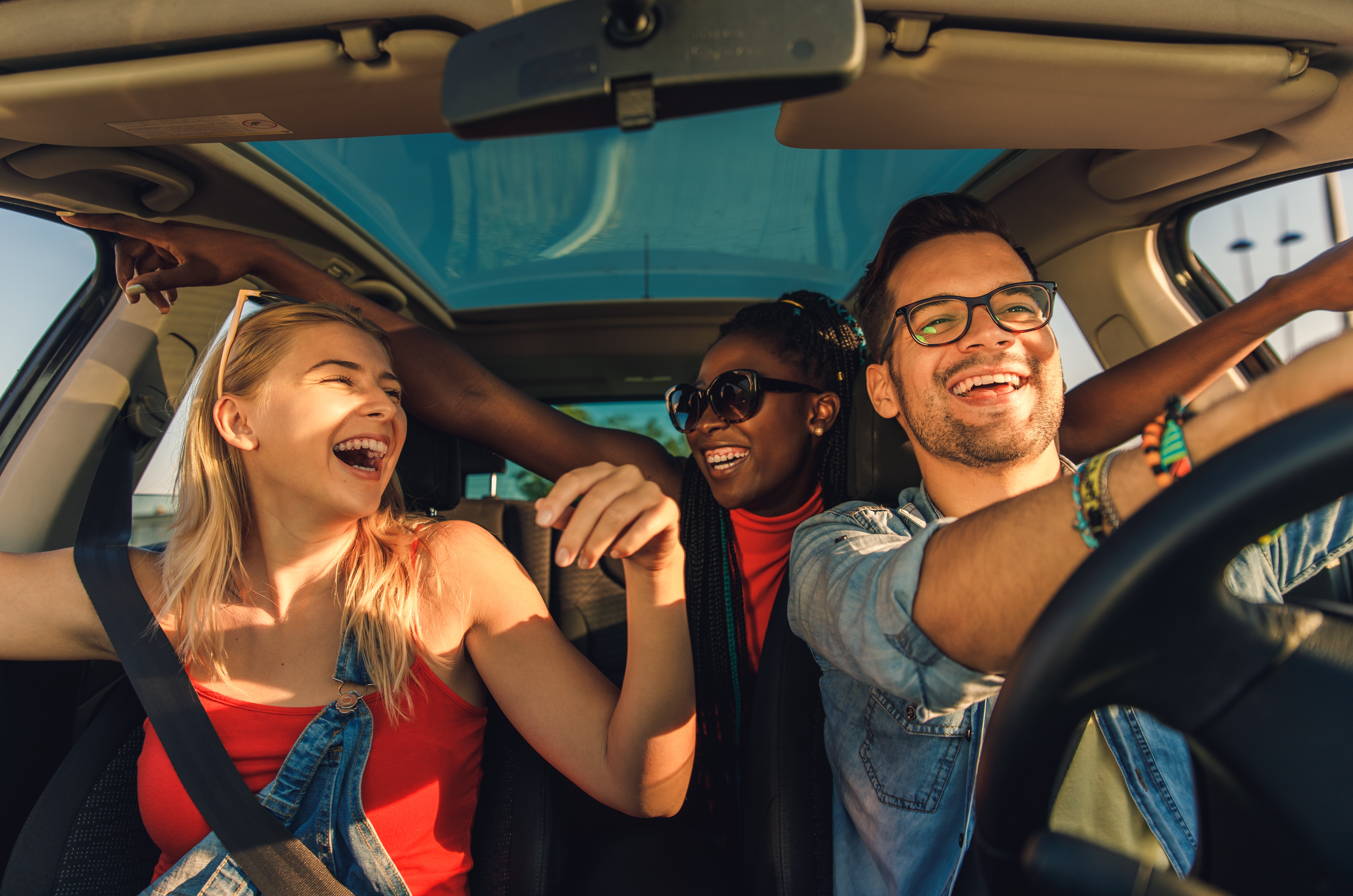 friends-smiling-in-a-car-road-trip-2026-03-25-05-05-56-utc.jpg